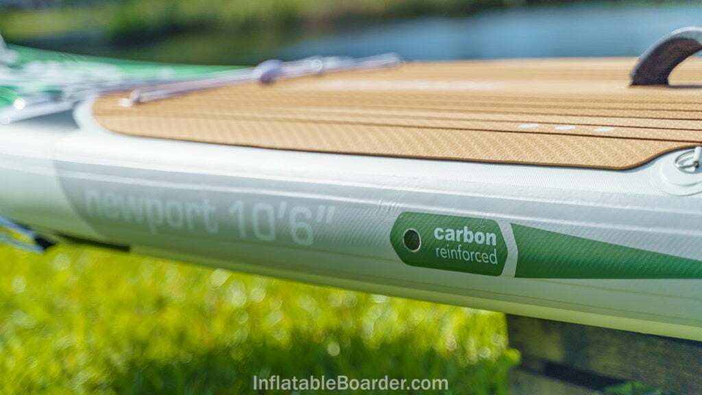 The carbon fiber reinforced side rail of the Newport 10'6".