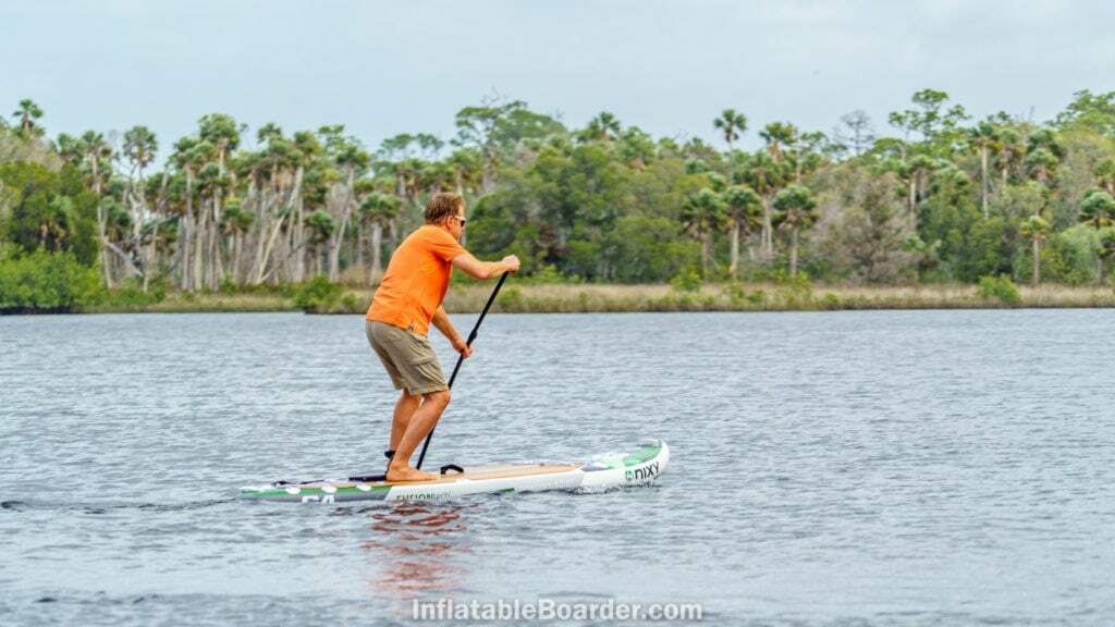 Hard paddling the Newport on a lake.
