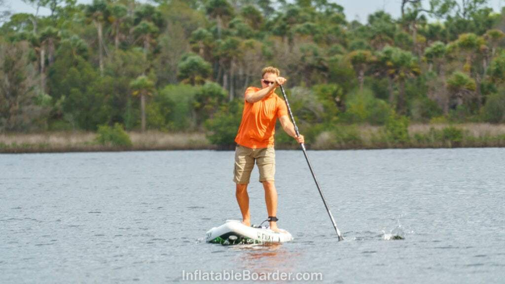 Nixy Newport paddling hard on ocean