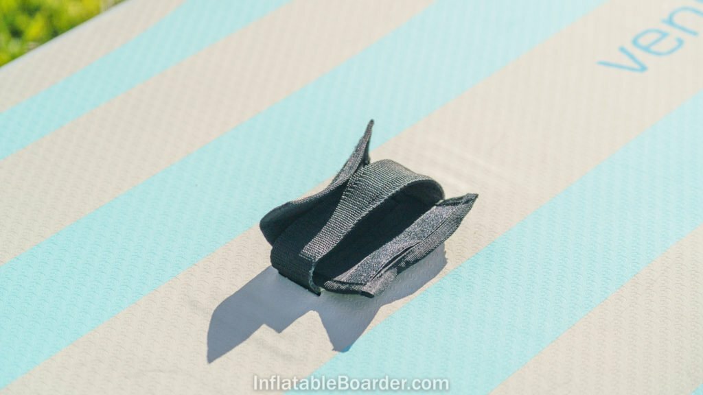 The center handle of the board has a removable neoprene cushion.