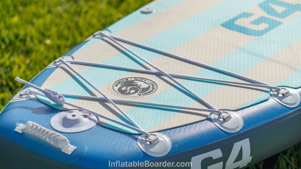 The back of the board features a handle and action mount with integrated SUP leash point.