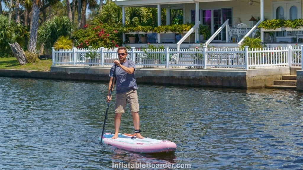 Paddling the board straight on to demonstrate tracking ability.