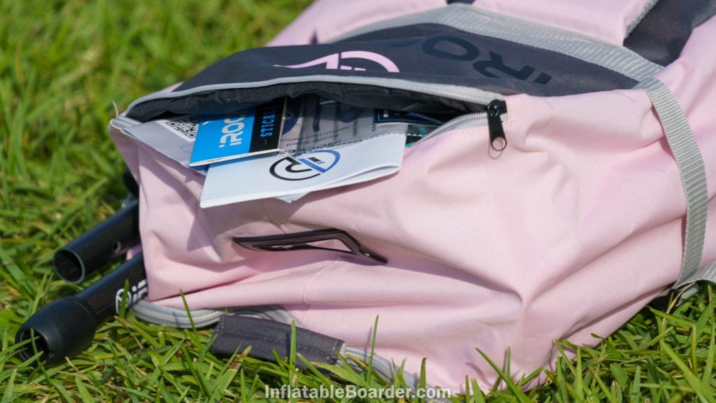A small zipper pocket can be found at the very top of the back of the bag.