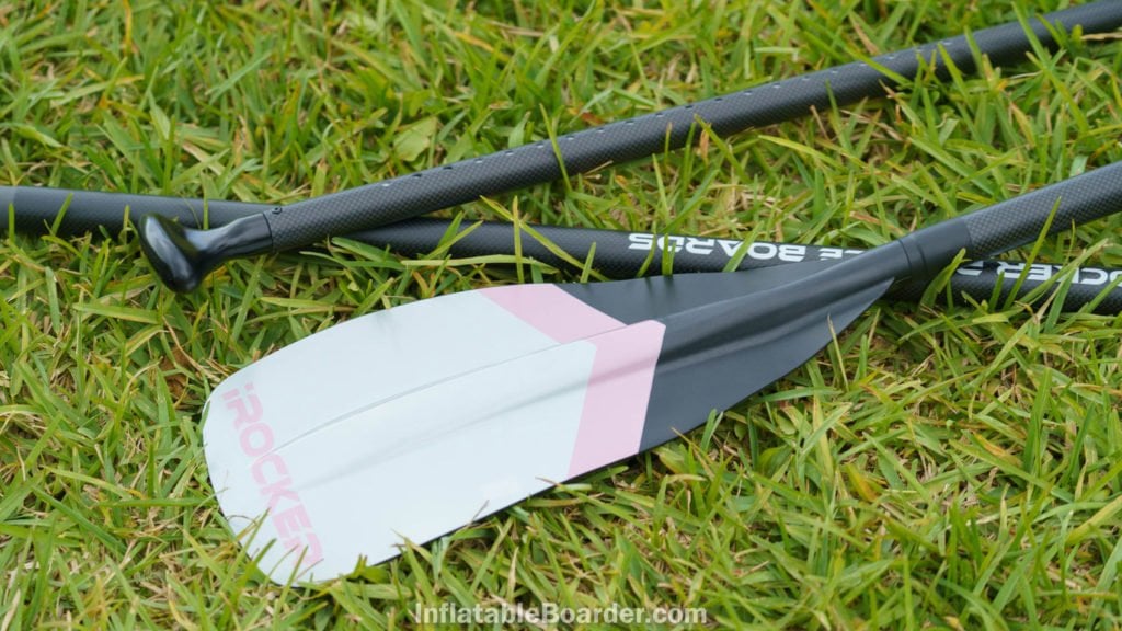 Pink paddle blade and carbon fiber paddle shafts.