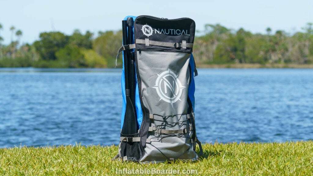 Overview of the front of the bag with compression straps, paddle holder, and bungie cargo area.