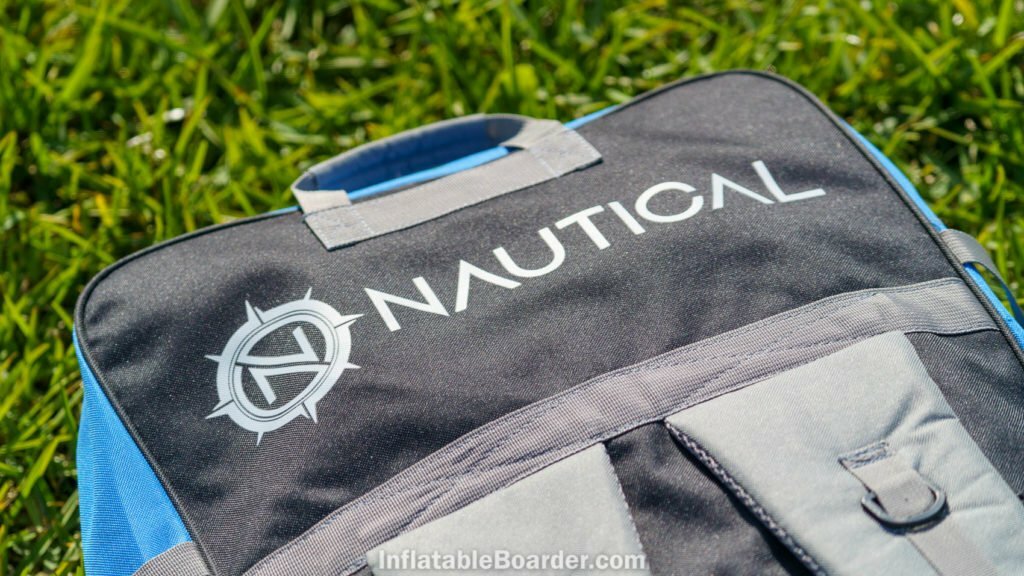 Top-back of the bag with NAUTICAL logo and padded handle.