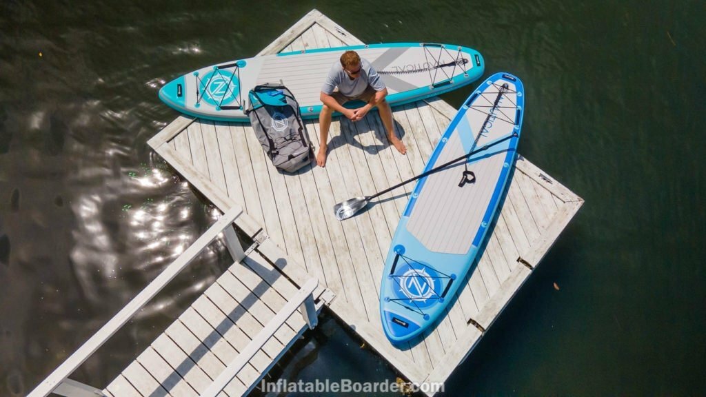 The 2021 teal and blue NAUTICAL boards on a dock from above.