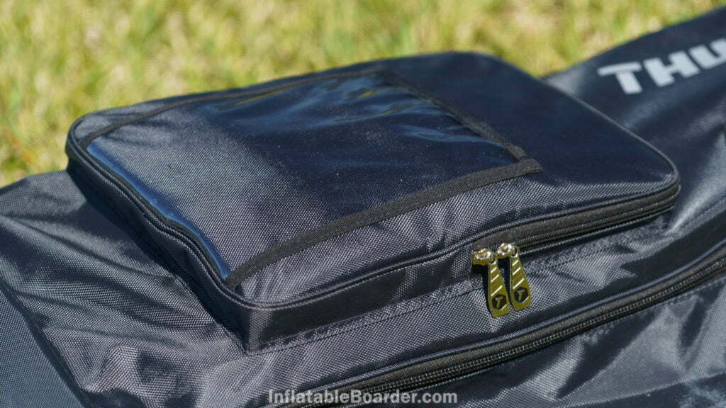 The front pocket of the bag has sturdy zipper pulls and a clear plastic windowed pocket.