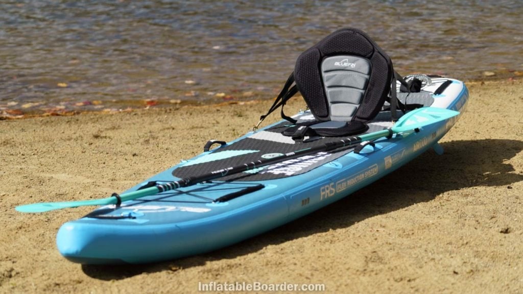 Cruise Carbon laying on a beach with kayak seat attachment.