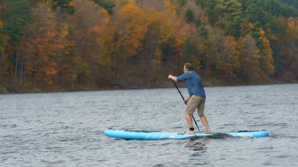 Rear view of paddling the Sprint on a lake.