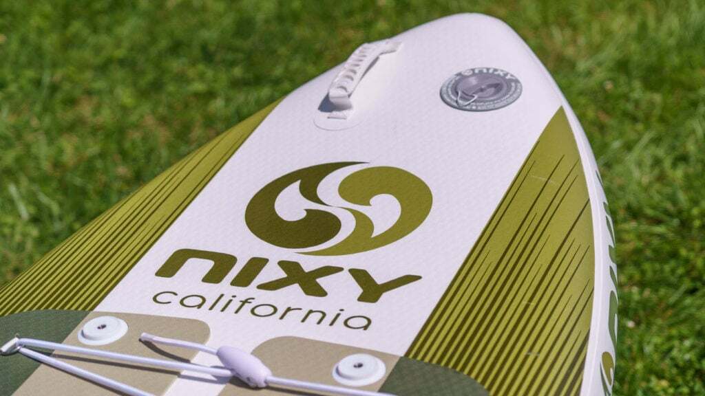 Front of the board with handle, valve, NIXY logo, and action mounts in view.