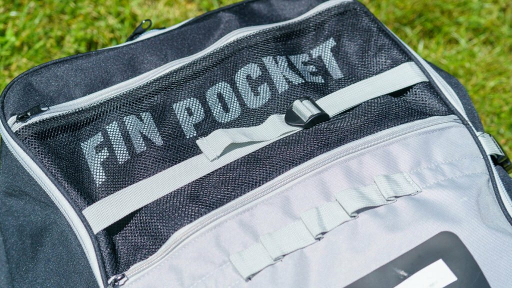 Detail of the mesh fin pocket at the top of the bag.