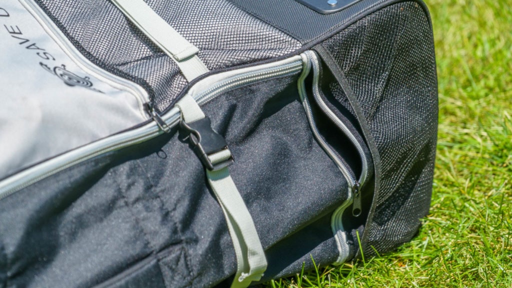 The sides of the bag have a zipper pocket, and mesh paddle pocket.