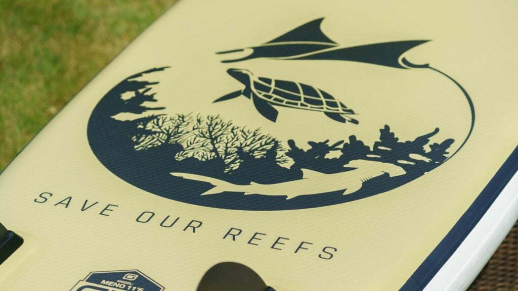 The large Save Our Reefs logo on the bottom of the SUP.